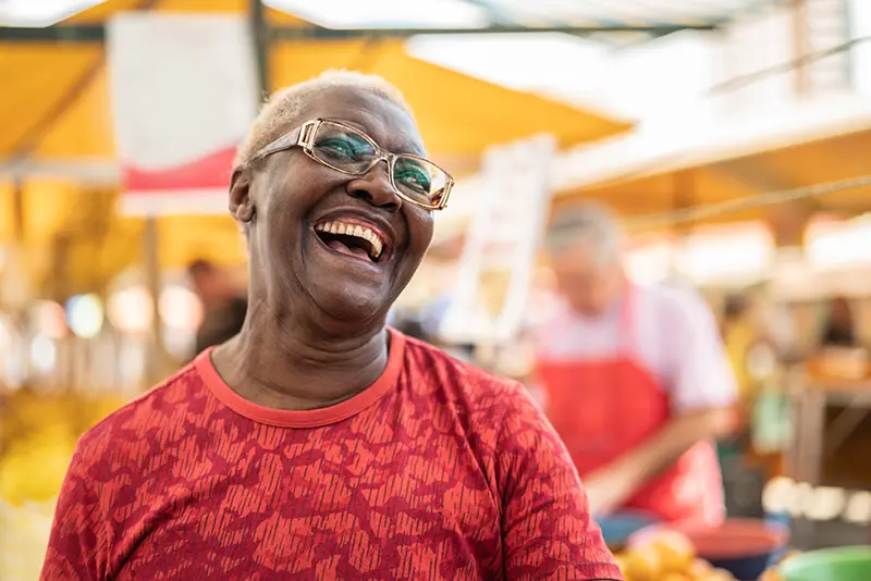 happy senior woman laughing