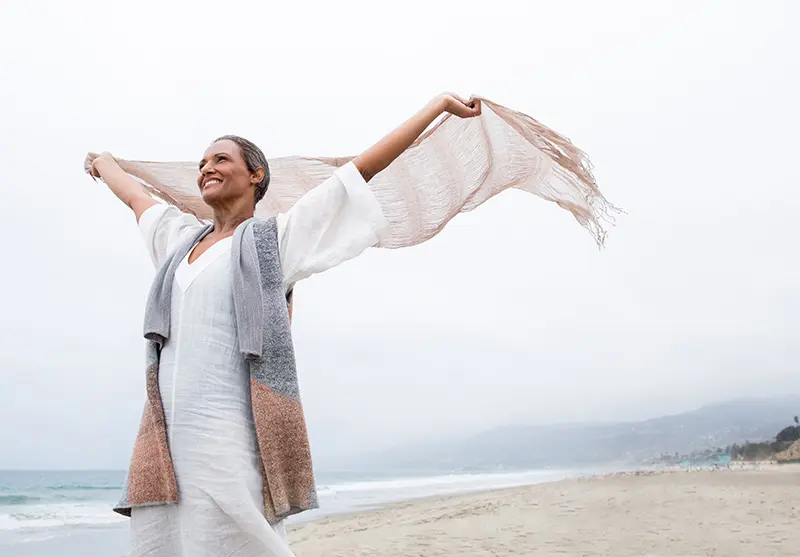 woman on beach in wind